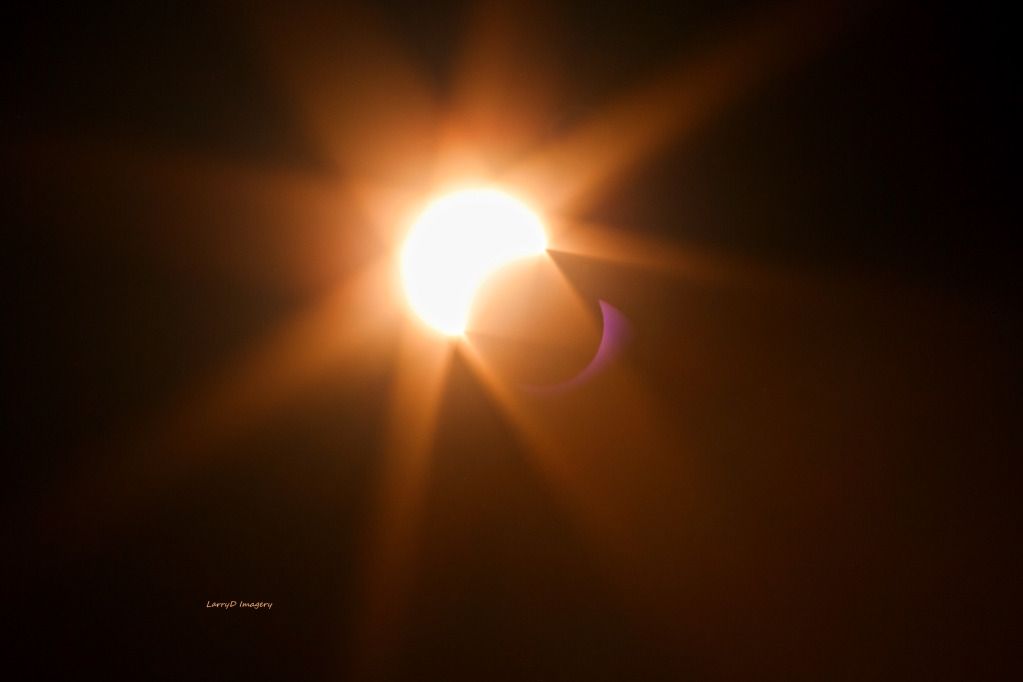 IMAGE: http://i1199.photobucket.com/albums/aa472/LarrysPhotos2/Solar%20Eclipse/SE4A1327.jpg