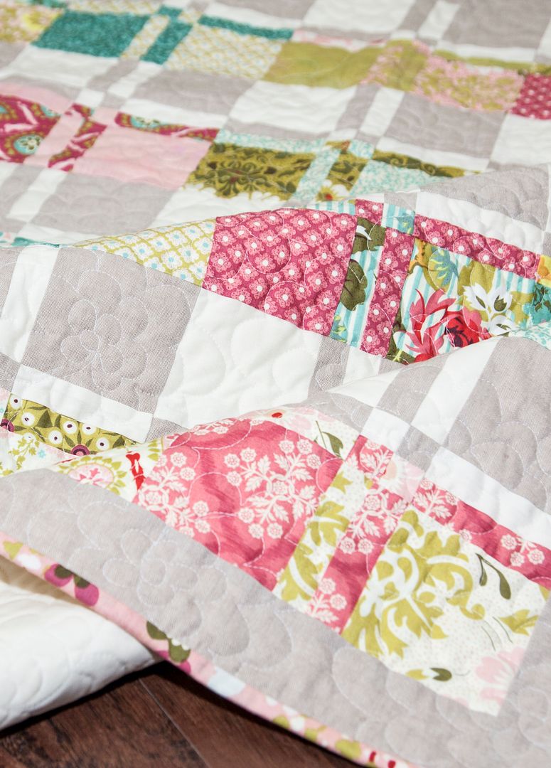 Lickety Split disappearing 4-to-9 patch baby quilt pattern using 2 charm packs. Cute baby quilt by Lella Boutique using Hello Luscious fabric by BasicGrey for Moda Fabrics.