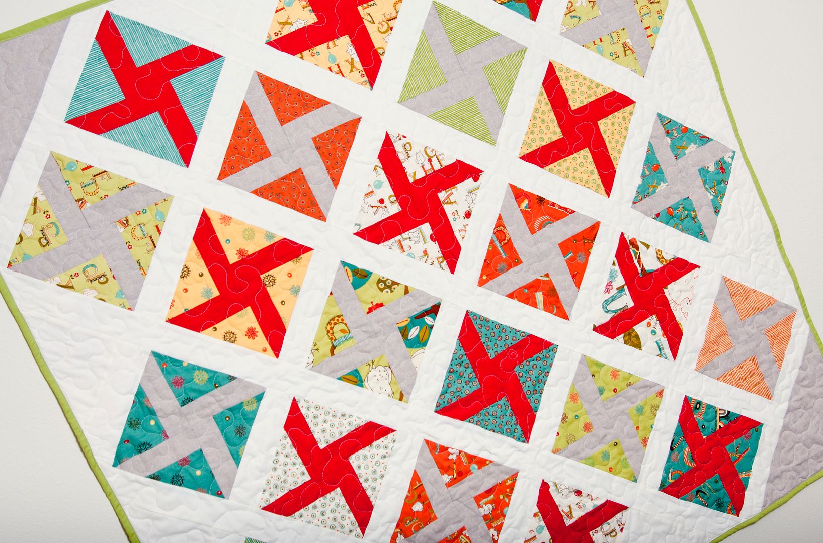 The North Wind baby boy quilt by Lella Boutique. Make it with 2 charm packs (precut 5" squares) or 7 fat quarters. 