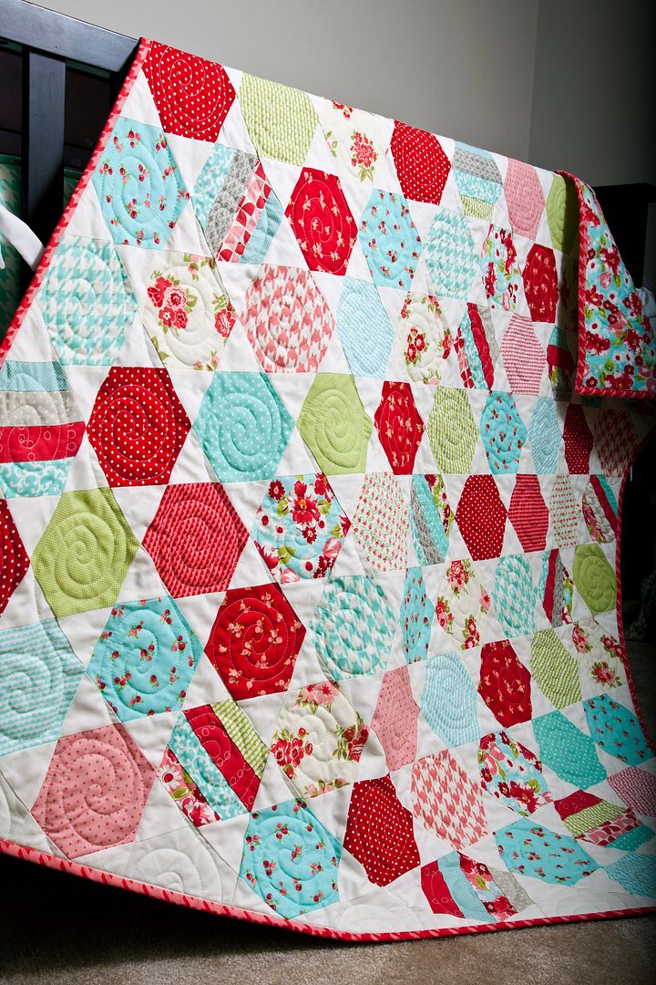 Juggle hexagon quilt PDF pattern by Thimble Blossoms. Makes a sweet baby quilt in these Ruby fabric by Bonnie & Camille for Moda Fabrics.